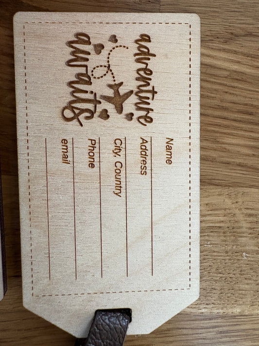 close up image of luggage tag adventure awaits
